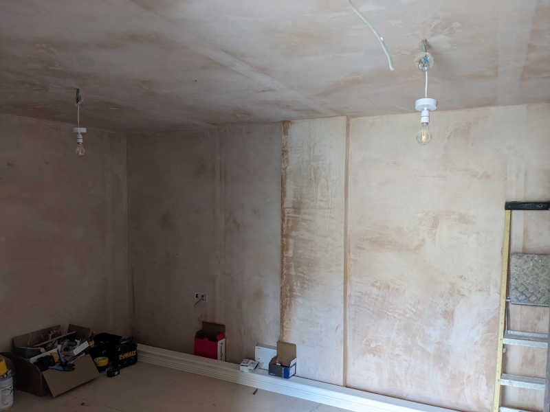 Interior view showing the walls after plastering.